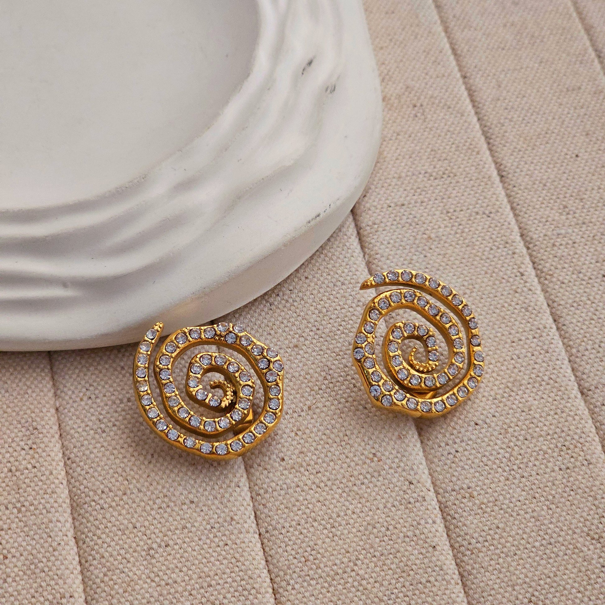 Luke Twirl Zircon Stud Earrings-1  taahirajewellery